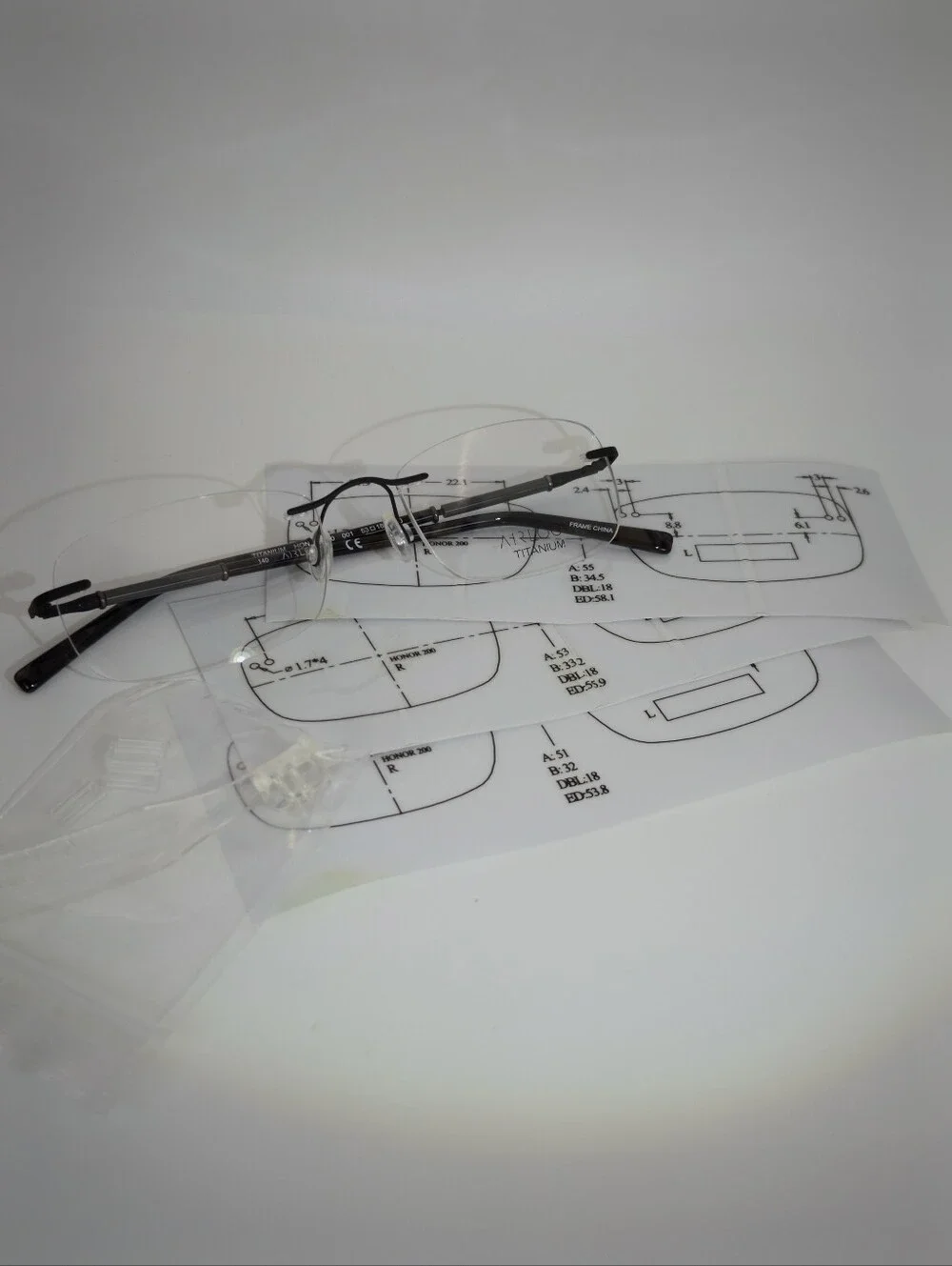 Airlock Titanium. Rimless Compression Mount. Patterns Mounting Bushing Inc.